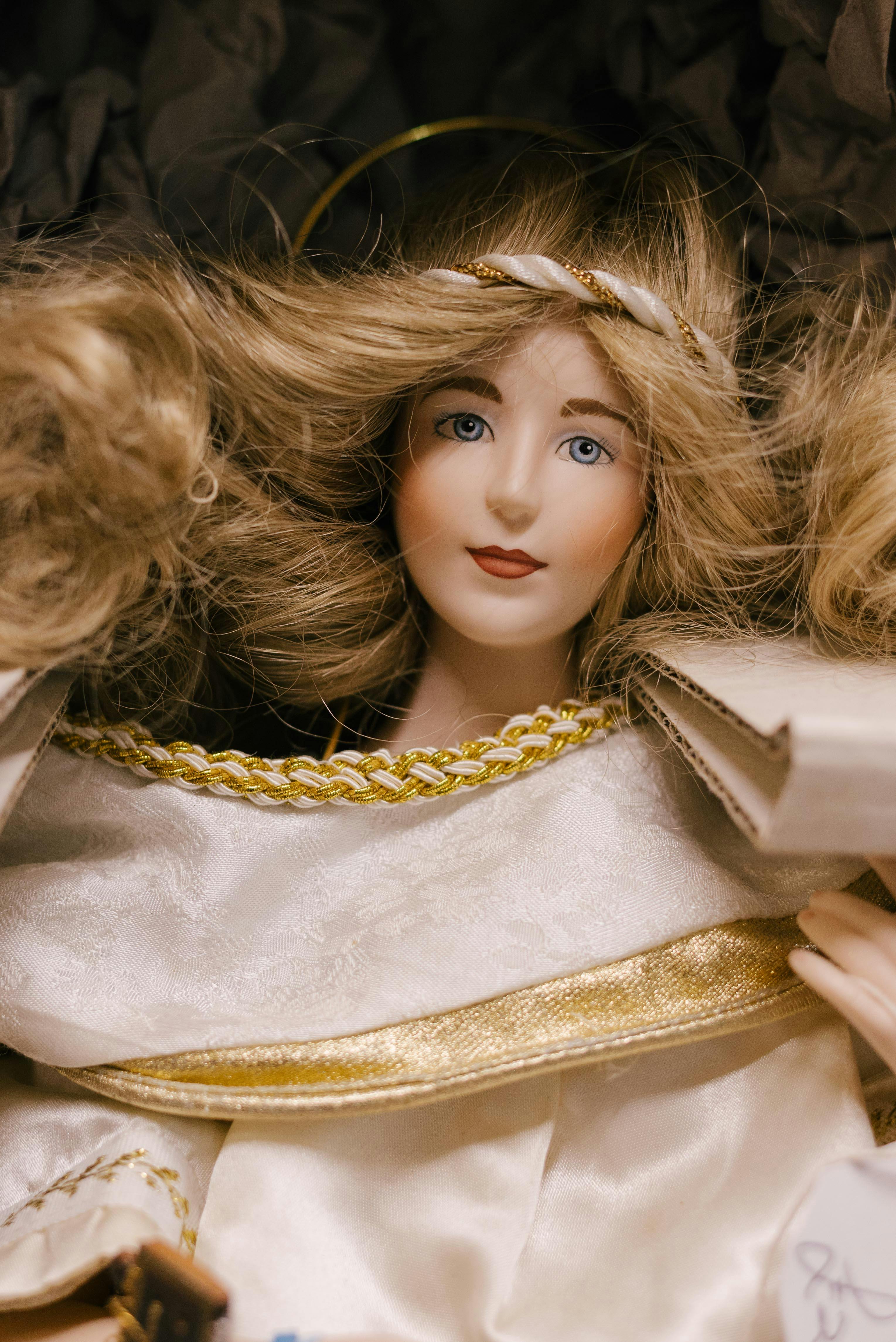 close up of blonde doll