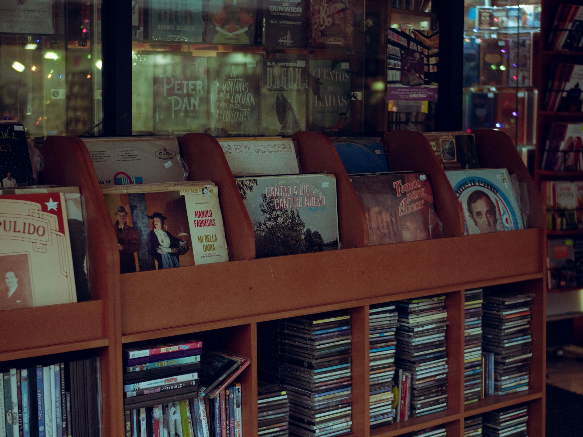 Explore a retro music shop with vintage vinyl records and CDs on display in Xalapa, Mexico.