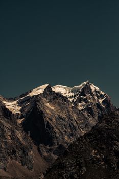 Stunning view of snow-capped mountains under a clear sky in Kaza, India.