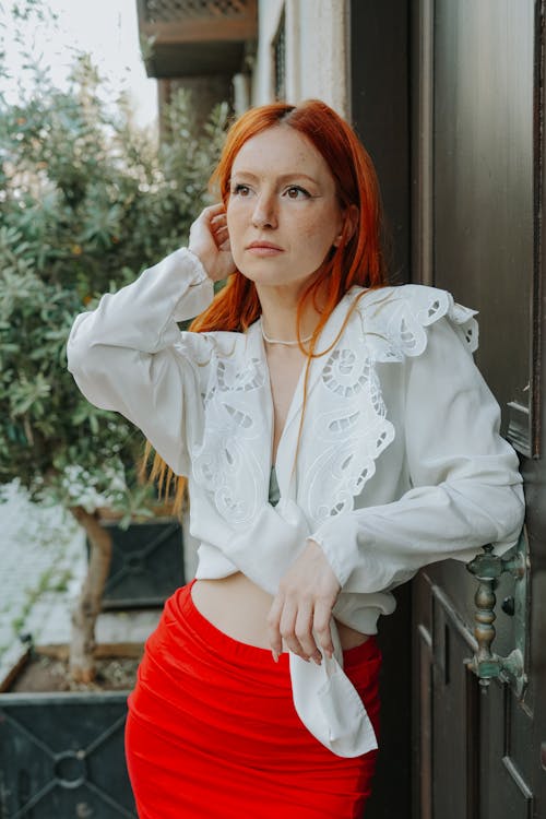 Red-haired Woman Posing Outdoors