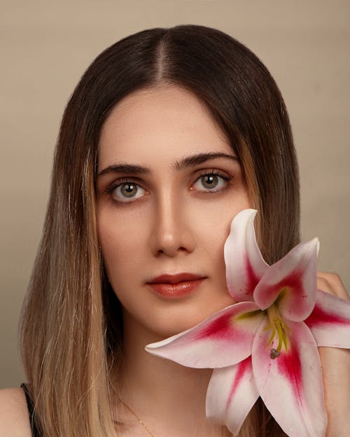 Portrait of Woman with Flower