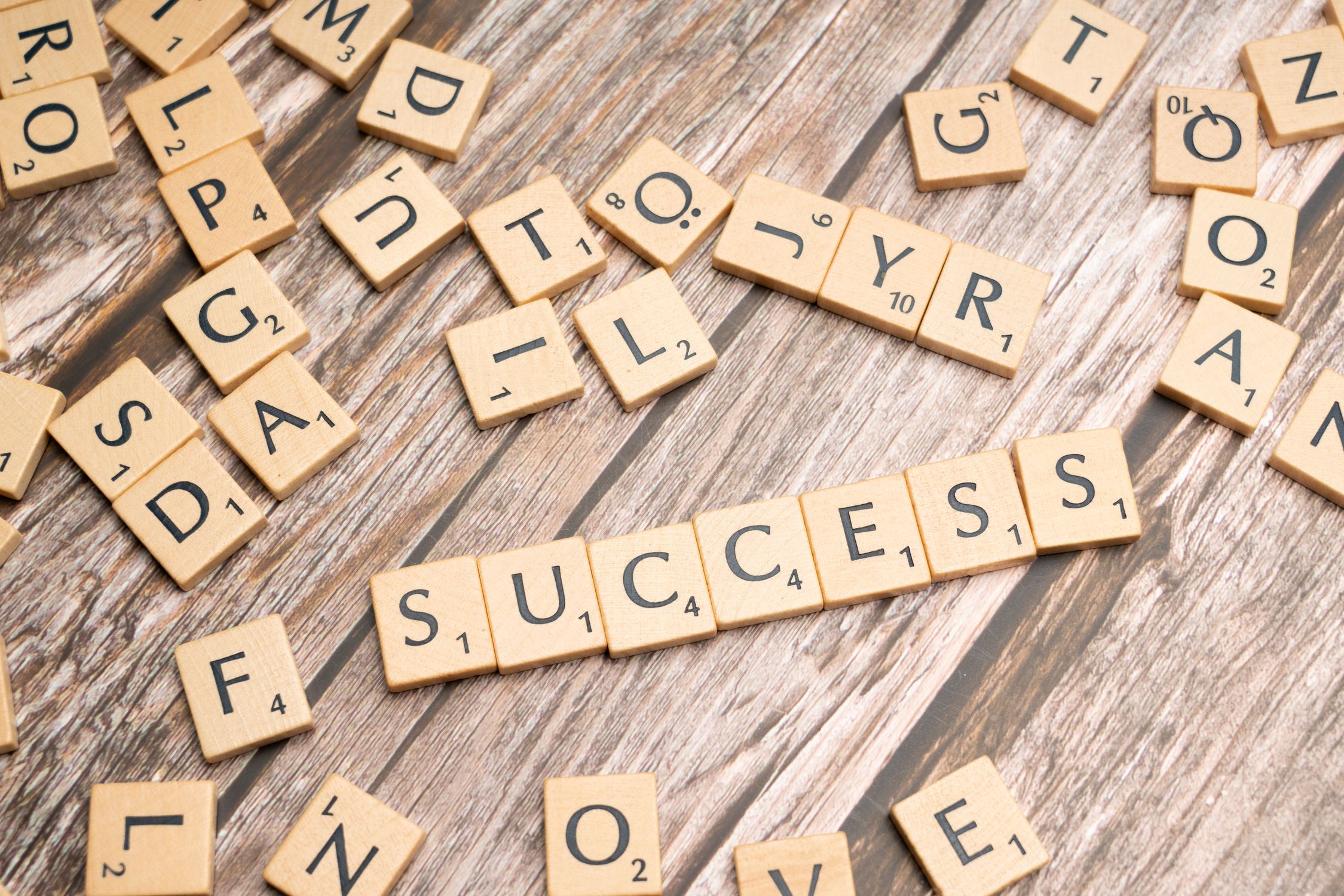 The word success spelled out in scrabble letters · Free Stock Photo