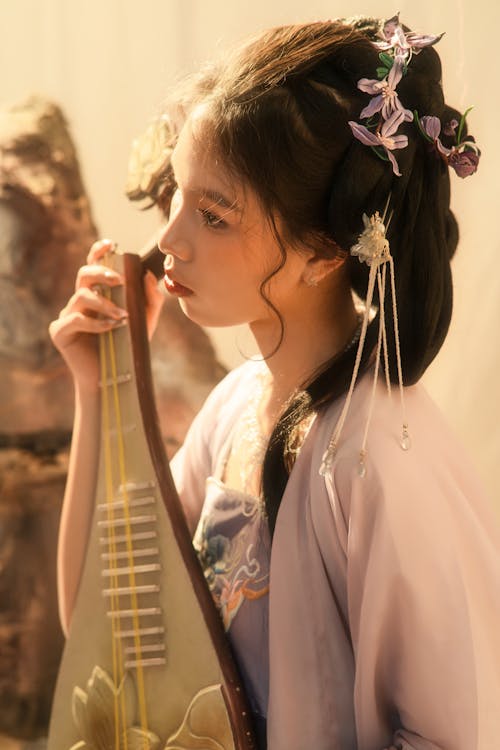 Young Woman Playing the Japanese Lute