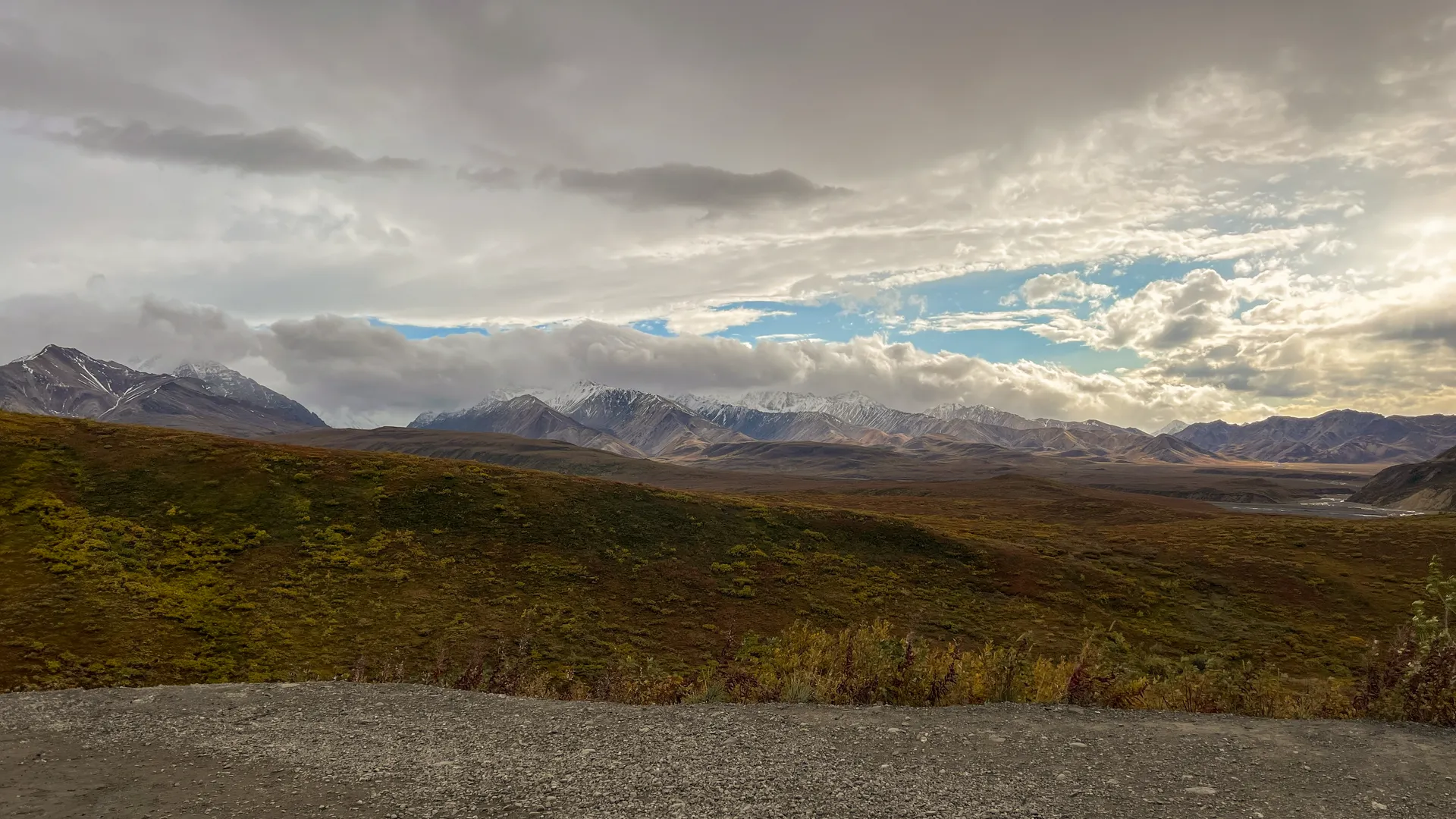 View of Denali National Park's rugged mountains and vast valleys in fall. View of Denali National Park's rugged mountains and vast valleys in fall.
