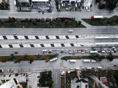 Aerial shot of busy traffic on city streets in Antalya, Türkiye, showcasing urban life.