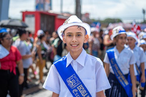 Schoolboy in a Uniform During a Parade 