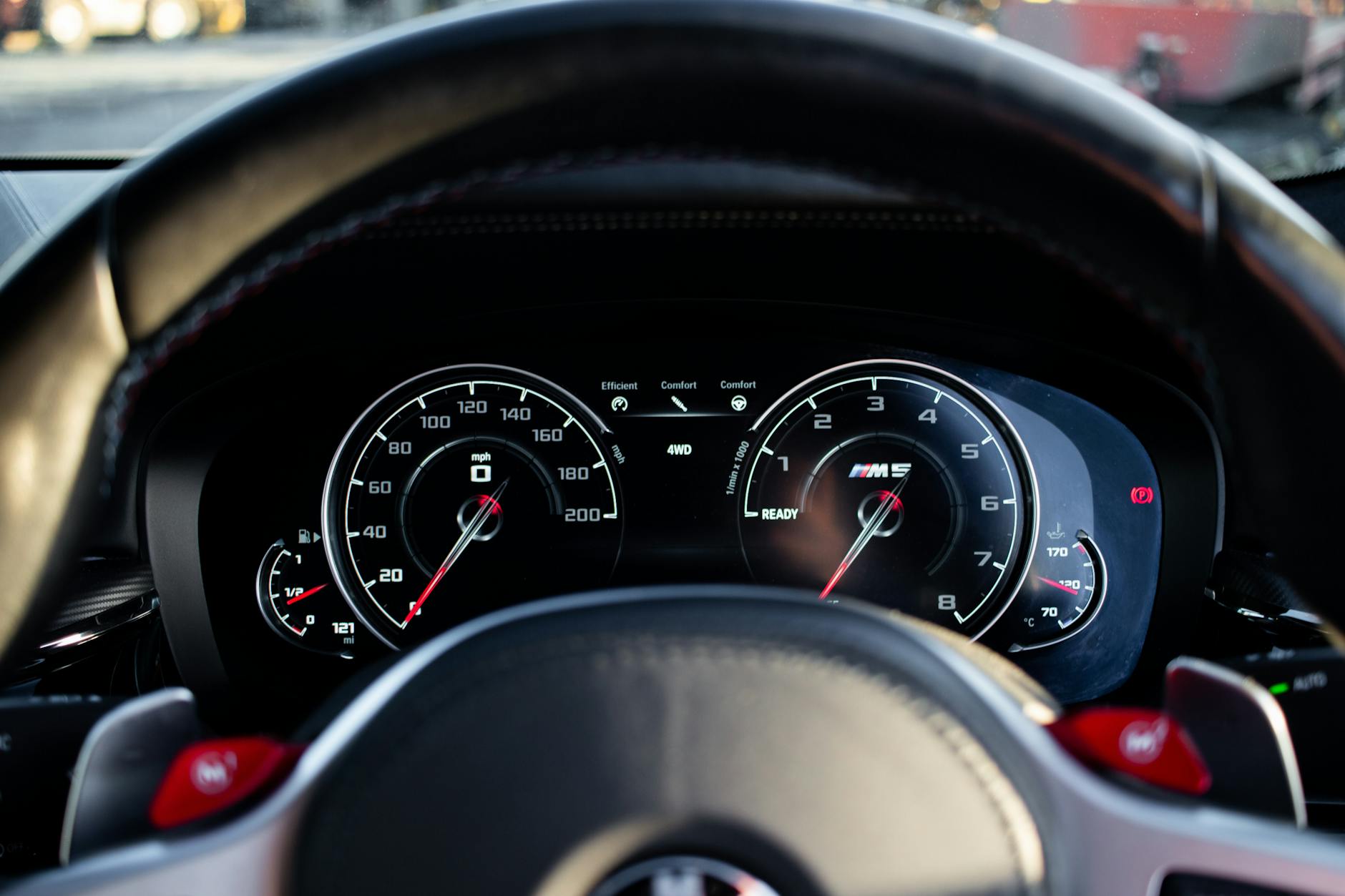 The dashboard of a car with a speedometer