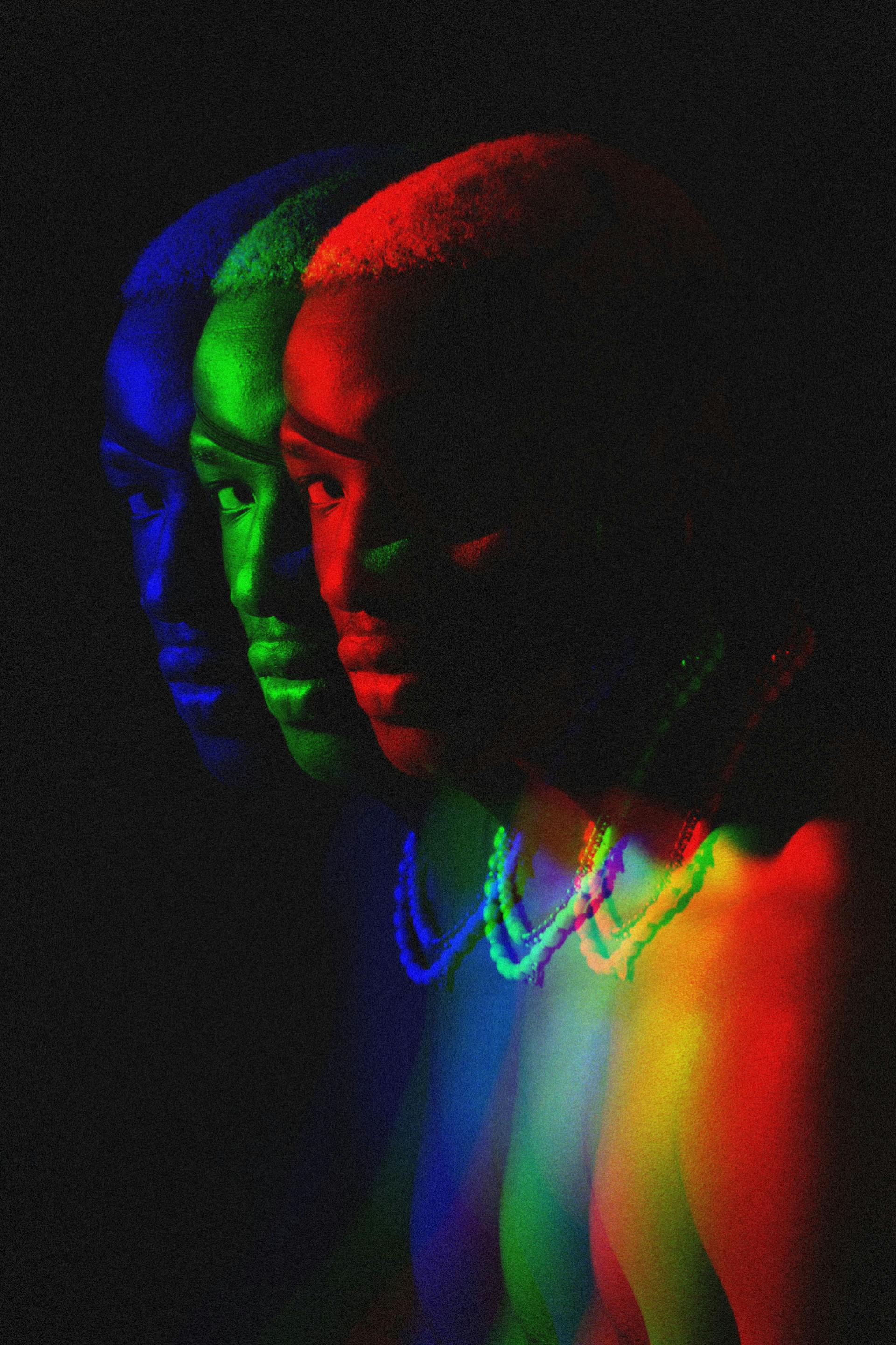Vibrant abstract portrait with creative neon lighting and multiple exposure effects, highlighting modern art style.