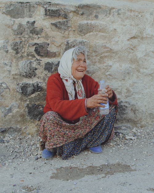 Kostnadsfri bild av äldre, flaska, håller