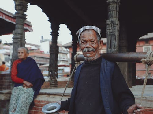 Smiling Elderly Man with Moustache