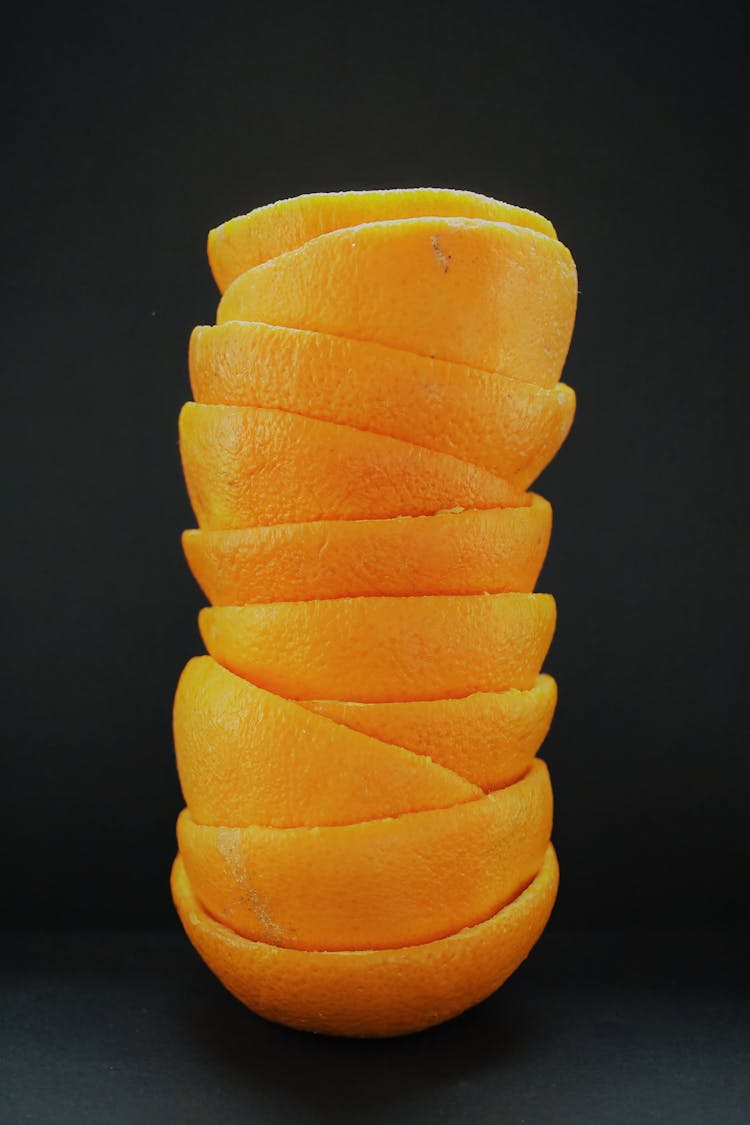 Stack Of Squeezed Halves Of Oranges