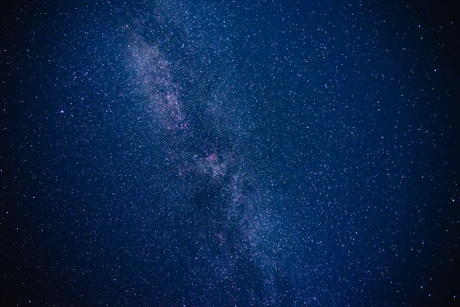 Capture the breathtaking beauty of the Milky Way galaxy with countless stars illuminating the night sky.