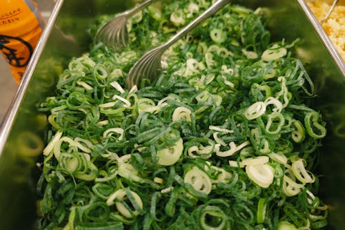 Close-up of a Container with Sliced Green Onion 