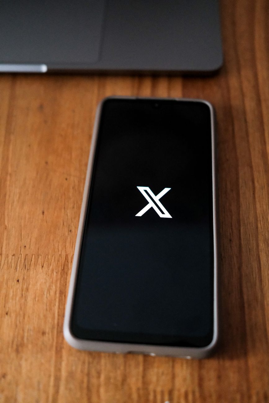 Close-up of a smartphone screen showing a signup form with visible input fields