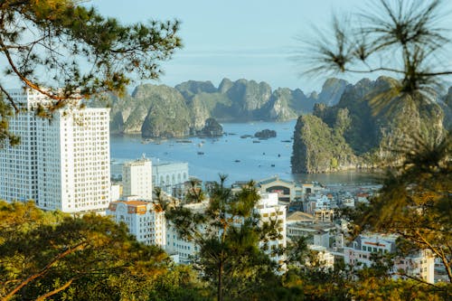 City Buildings with the Karst Formations of the Ha Long Bay in the Background