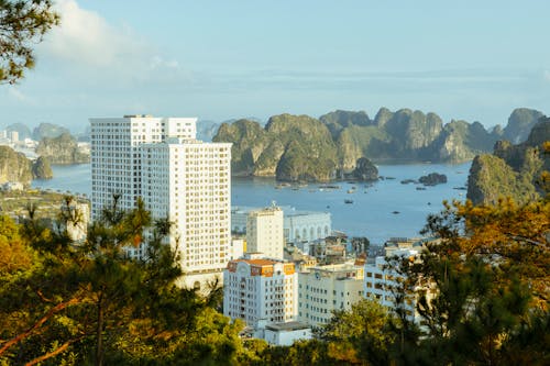 City Buildings with the Karst Formations of the Ha Long Bay in the Background