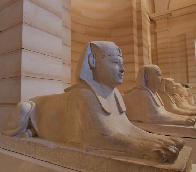 Grand Egyptian Museum main hall with ancient artifacts in Cairo, Egypt