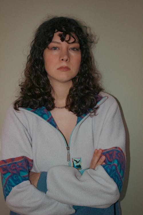 Portrait of Brunette Woman Wearing Tracksuit