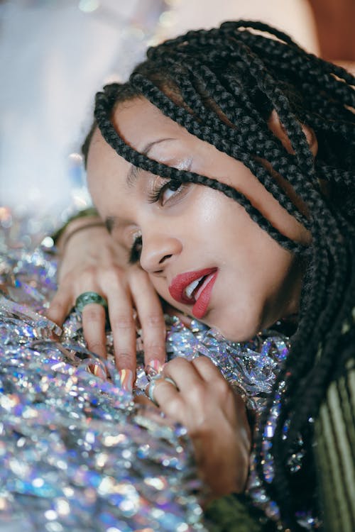 Young Woman with Dreadlocks Posing with Crystals