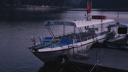 Empty Tourist Boat Moored at the Pier