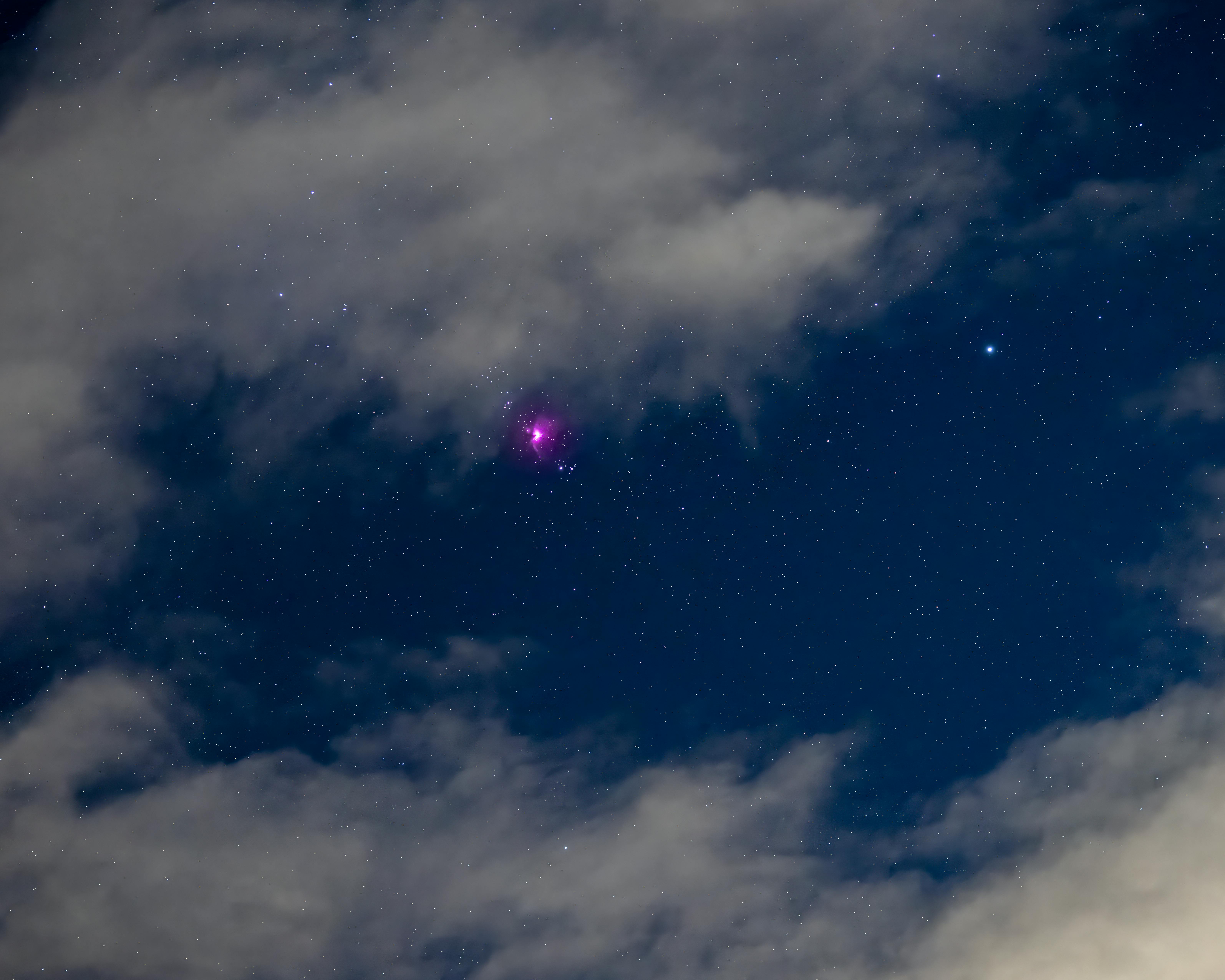 Violet Star Shining in a Cloudy Sky · Free Stock Photo