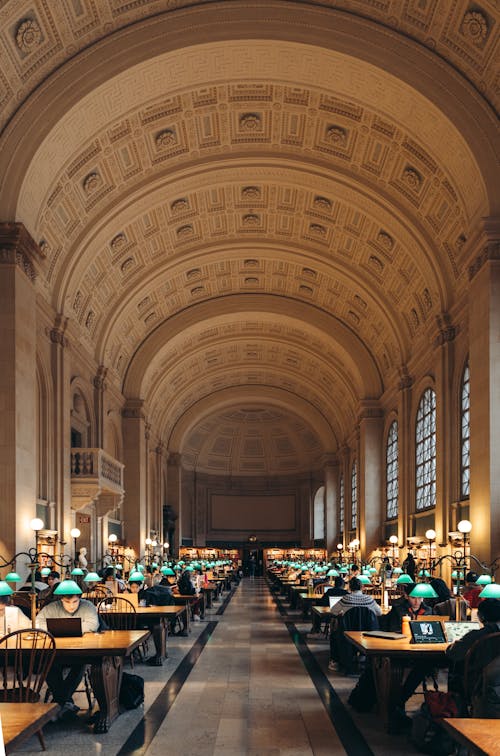 People Reading at Desks at a Public Library, Boston, USA