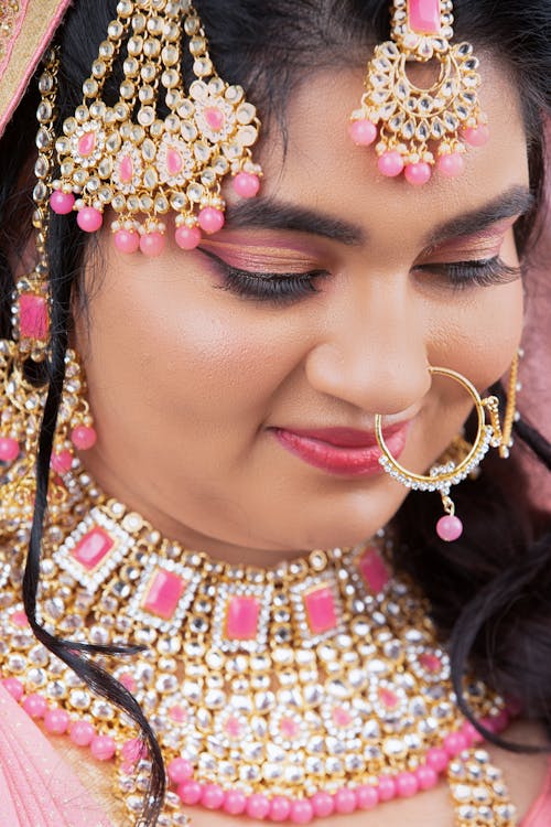 Woman with Traditional, Golden Piercing and Jewelry