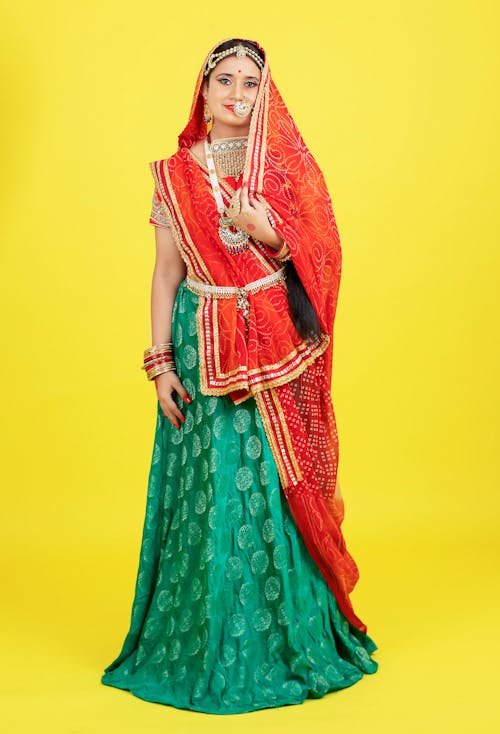 Woman Standing in Traditional Dress