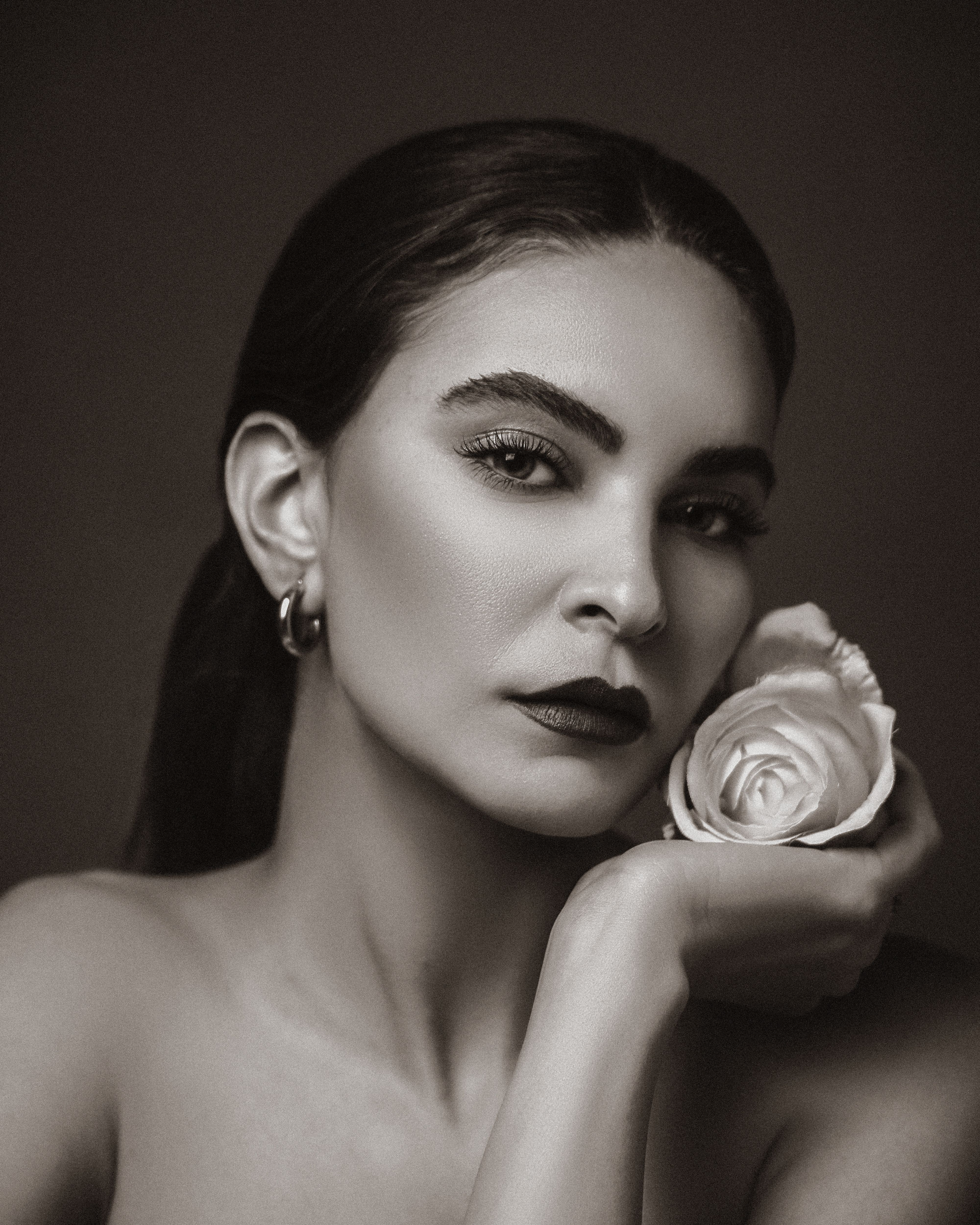 Portrait of Woman with Flower in Black and White · Free Stock Photo