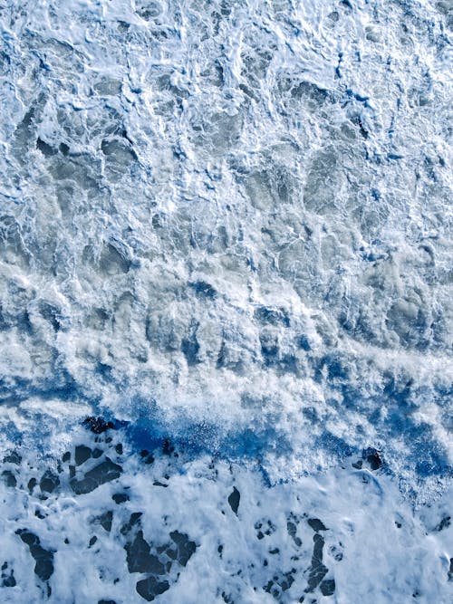 Close-up of the White Foam on the Sea Surface 