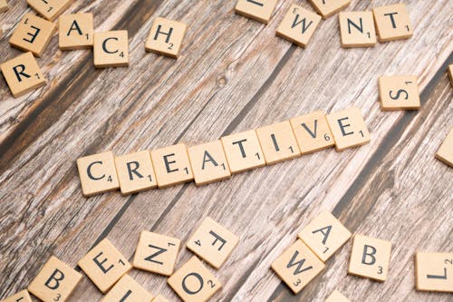 The word creative spelled out in scrabble letters