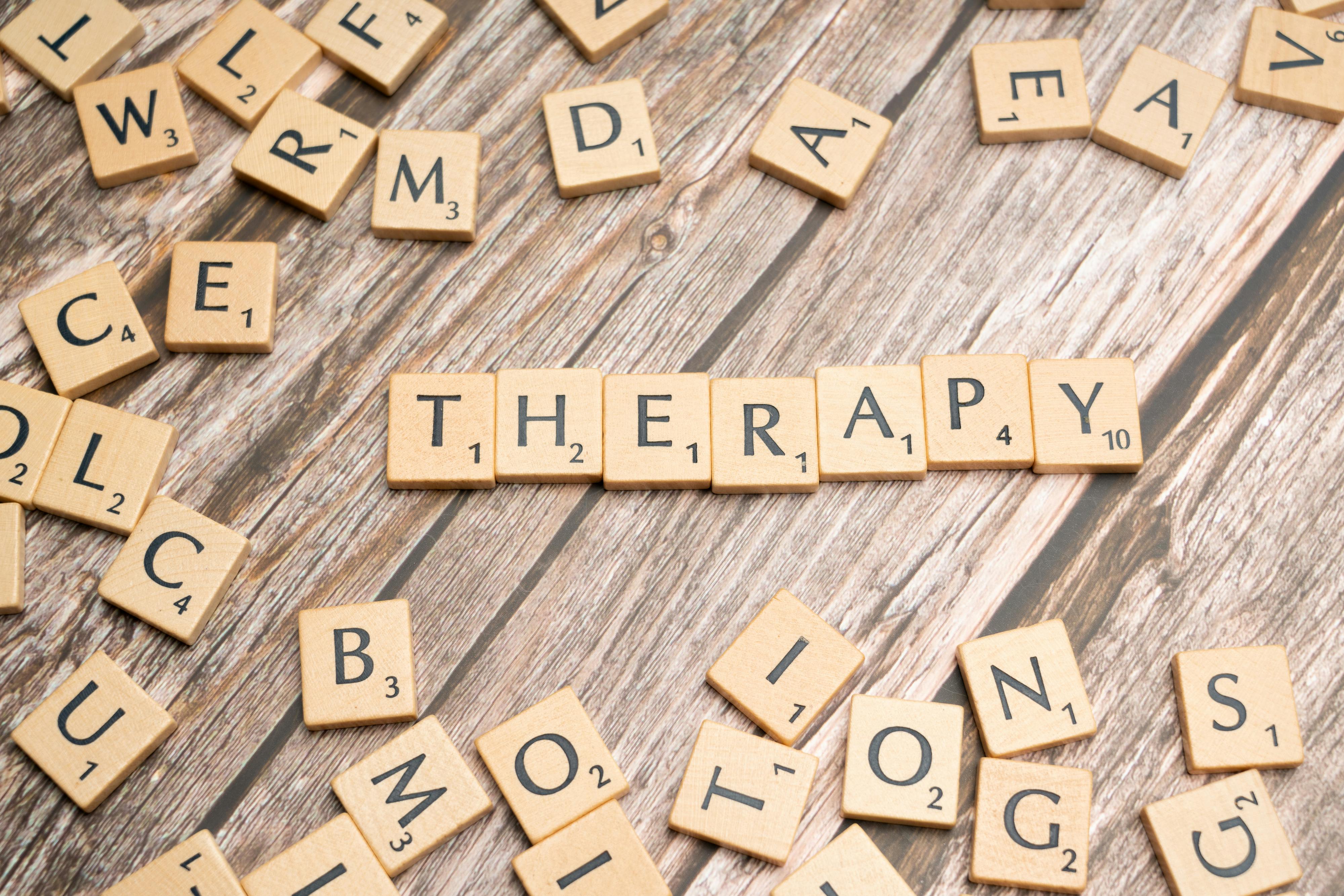 The word therapy spelled in Scrabble letters
