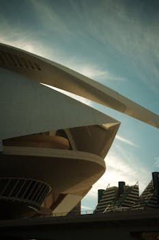 Explore the striking modern architecture of Valencia, bathed in the golden light of early sunrise.