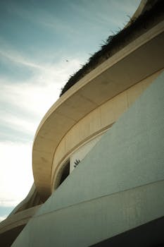 Explore the sleek curves and modern design of a building in Valencia, Spain.