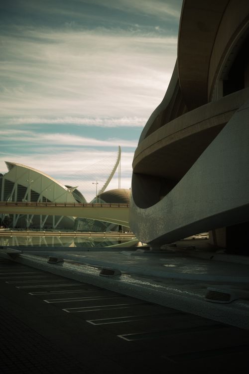 Free Beautiful modern architecture of Valencia's City of Arts and Sciences against a dynamic sky. Stock Photo