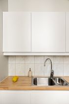 Reference: minimalist kitchen — photo by Lisa Anna on Pexels