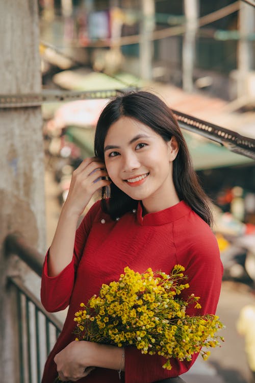 Smiling Woman with Flowers