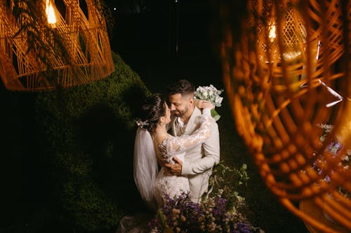 Newlyweds Hugging at Night