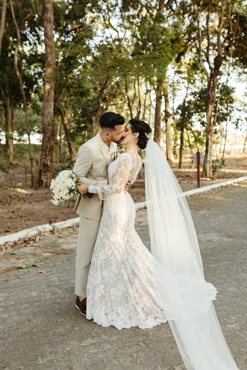 Newlyweds Kissing and Hugging