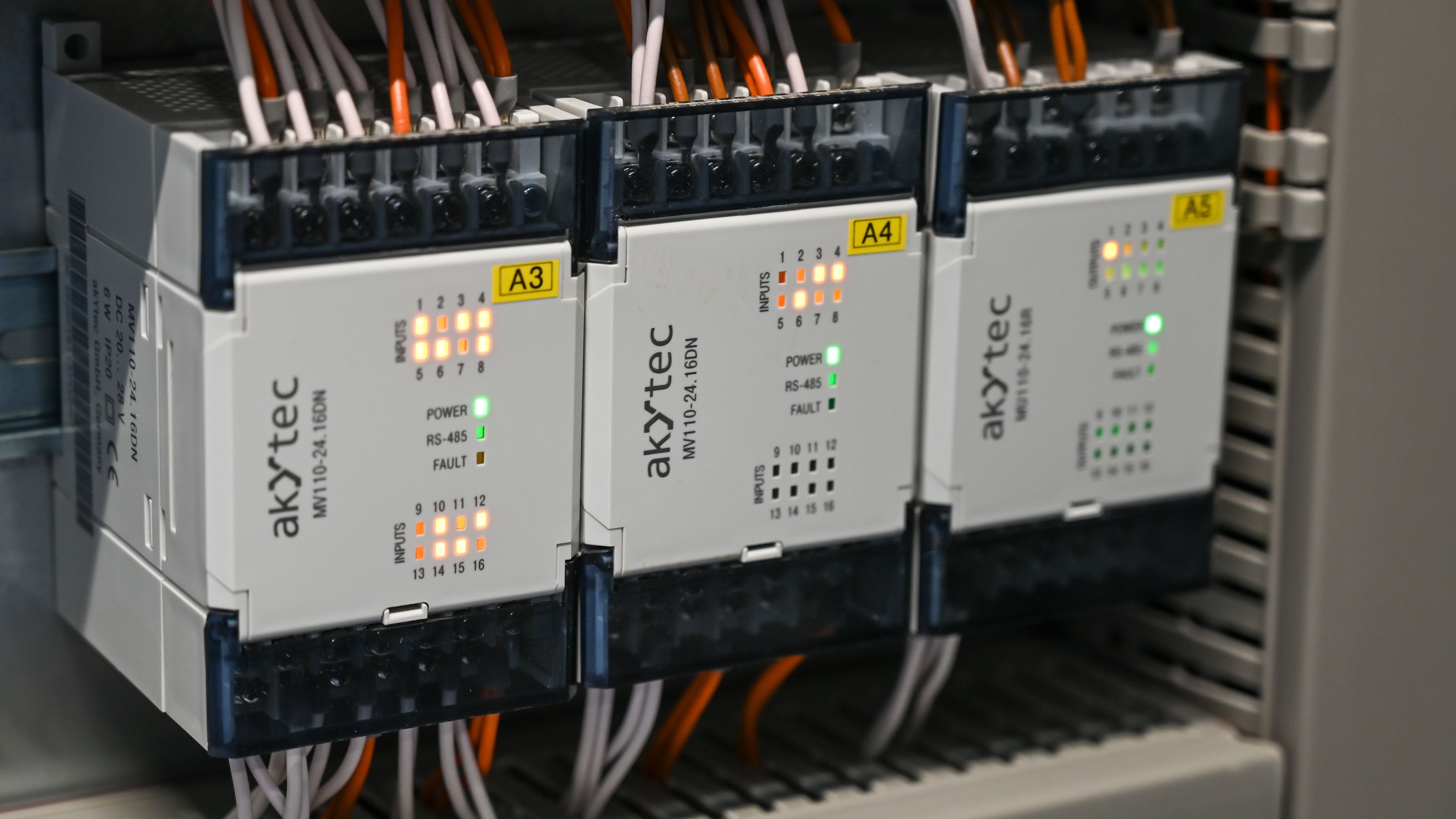 Industrial control modules with wiring and indicator lights