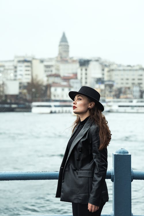 Portrait of Woman in Hat and Jacket on Sea Shore in Istanbul