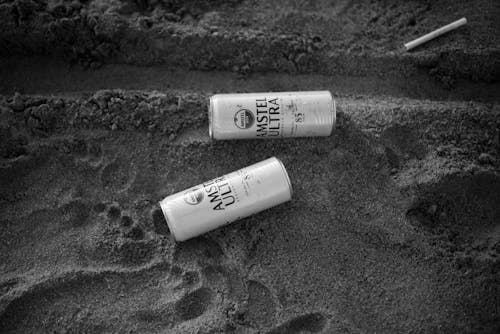 Cans of Beer on Beach