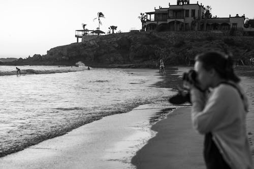 Woman Photographing at Beach