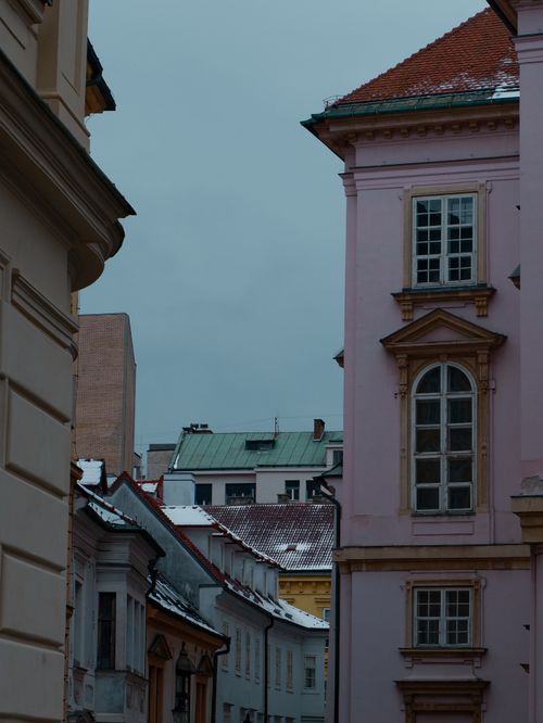 Free Captivating view of Bratislava's historic architecture in a snow-dusted urban setting. Stock Photo
