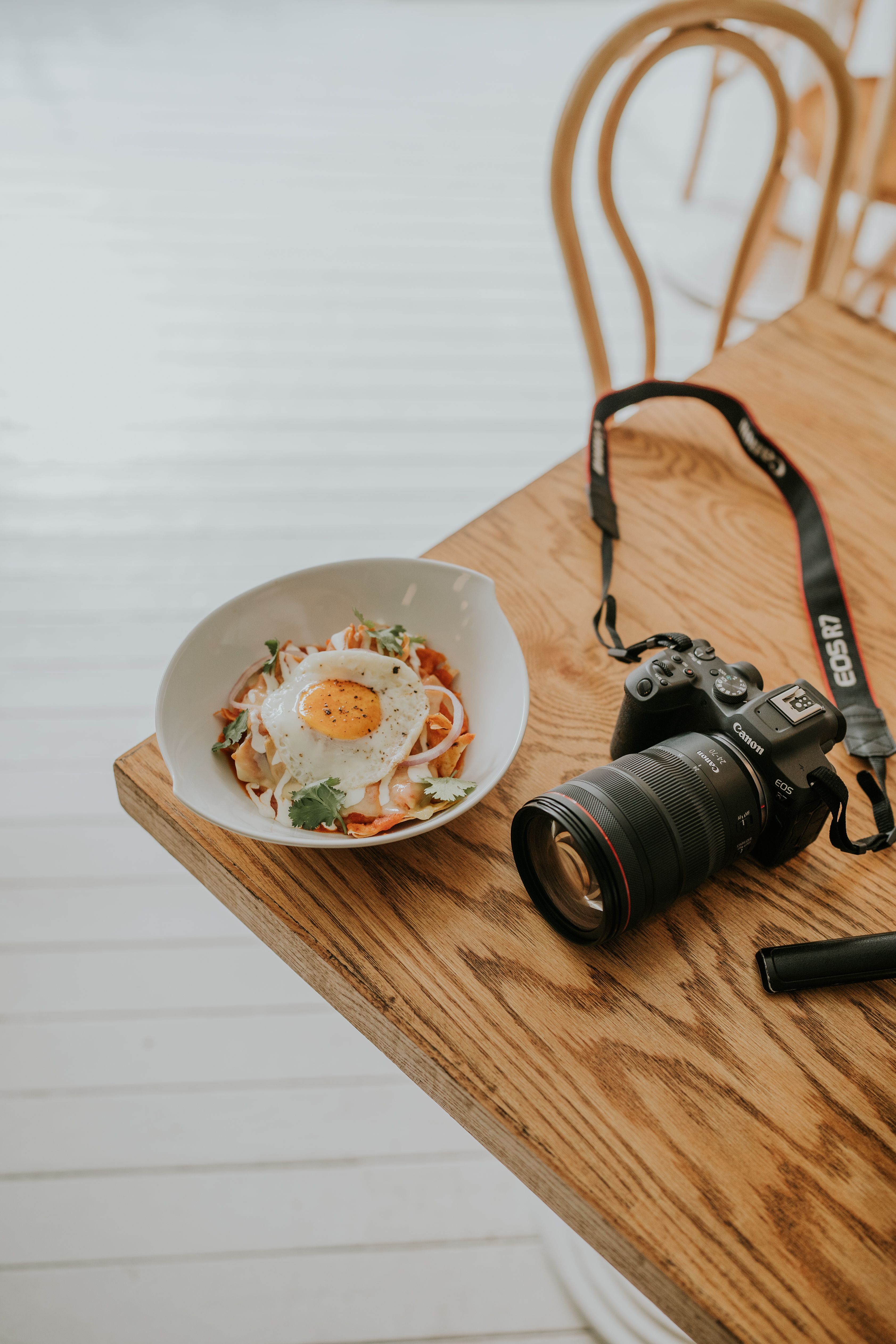 A Camera and a Meal on a Table · Free Stock Photo