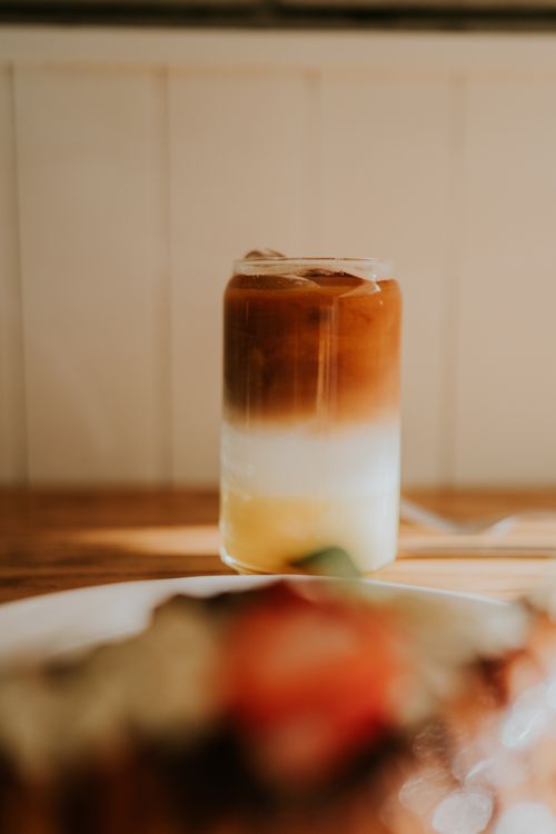 Free Taste the refreshing blend of iced coffee with creamy layers, perfect for a summer day. Stock Photo