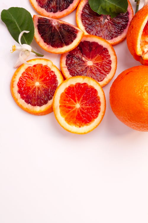 Безкоштовне стокове фото на тему «апельсини, вертикальні постріл, їжа»