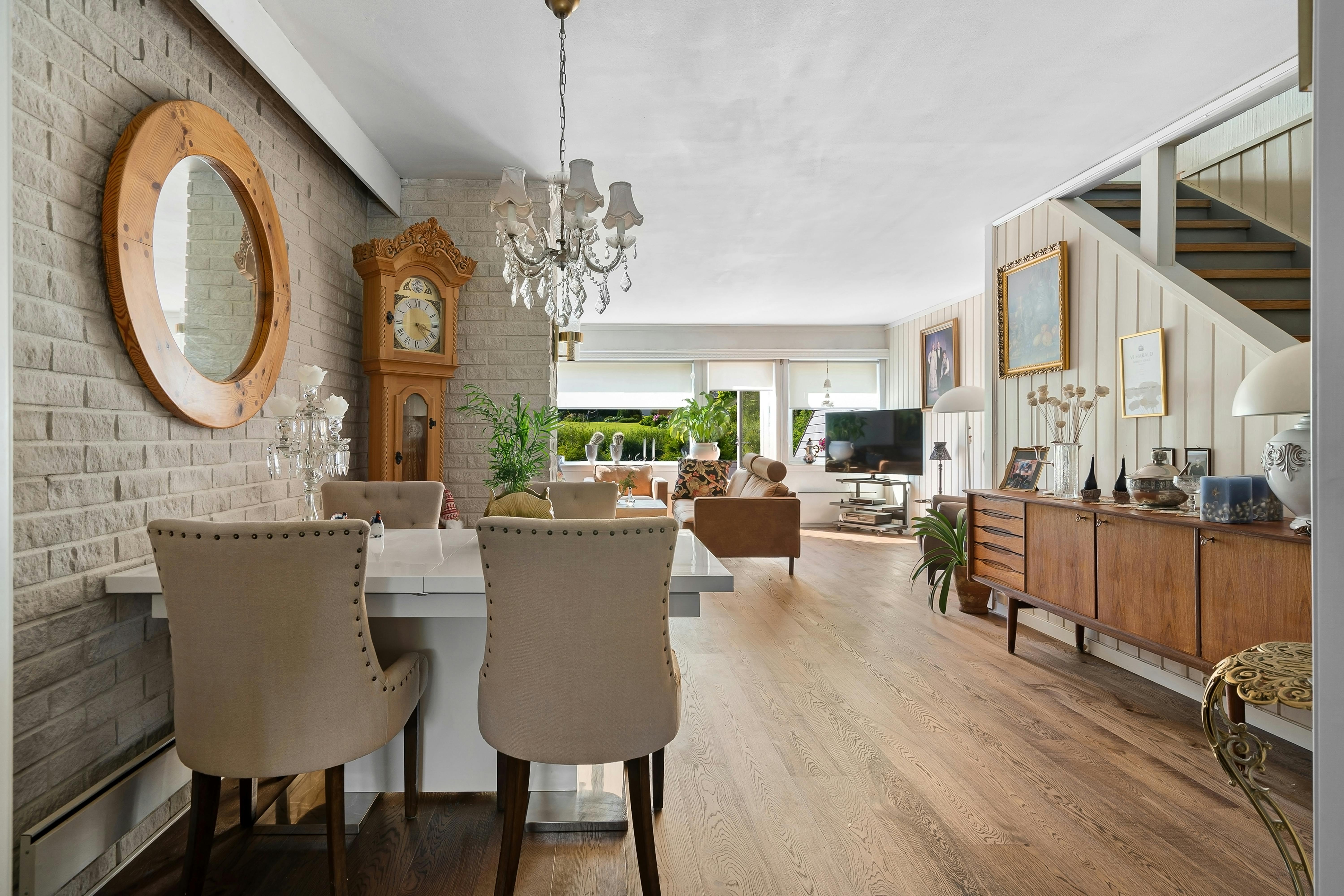 A man in a alice blue shirt with a thinking expression