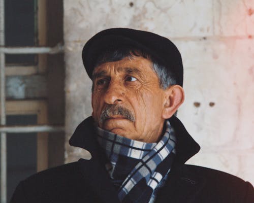 Portrait of Man in Ivy Cap