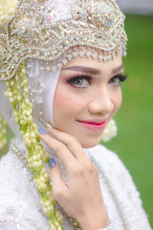 Portrait of a Beautiful Woman Wearing an Ornate Headdress